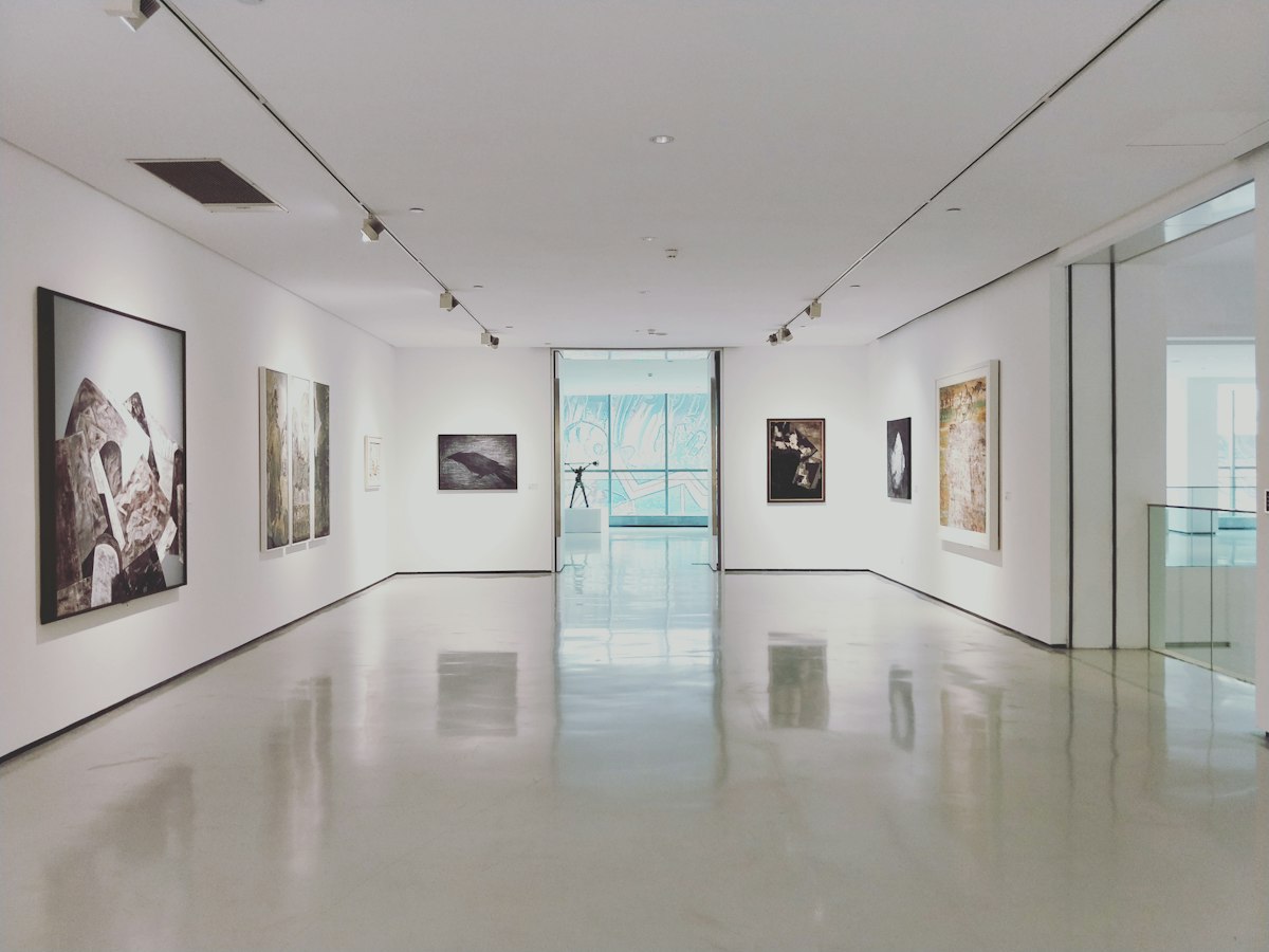A quiet museum gallery with paintings